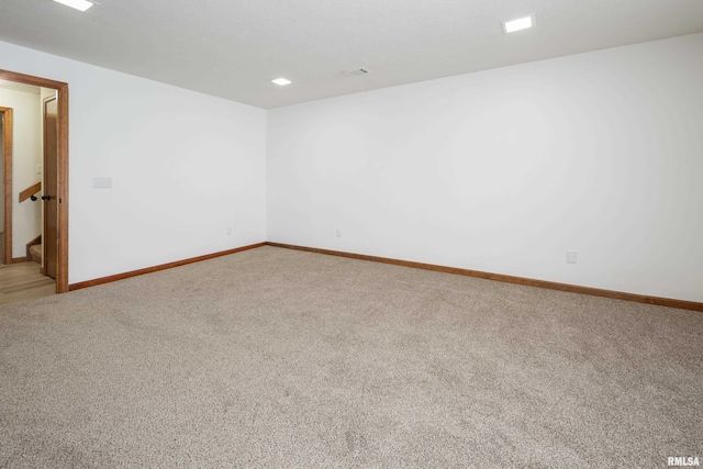 4554 Bunker Hill Dr, Bettendorf, IA 52722 - spare room with light colored carpet and recessed lighting