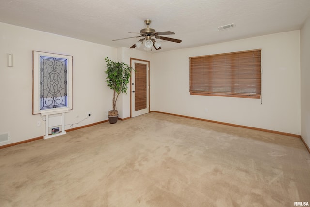 4554 Bunker Hill Dr, Bettendorf, IA 52722 - spare room featuring light colored carpet and a ceiling fan
