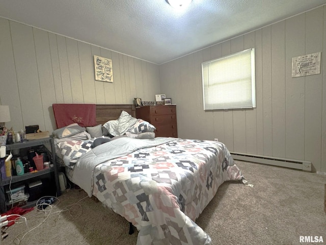 502 S Day St, West Frankfort, IL 62896 - bedroom featuring baseboard heating, carpet floors, and a textured ceiling