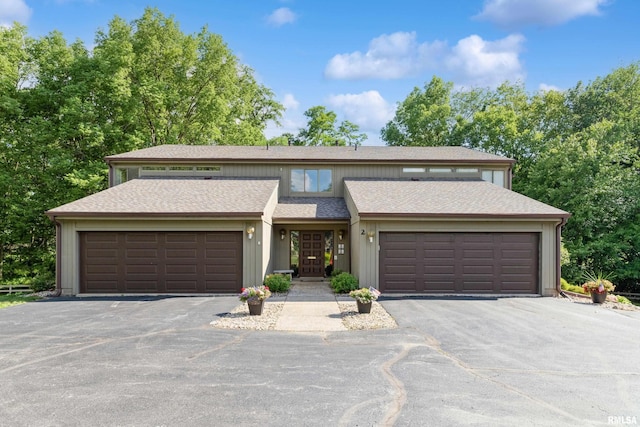 2200 36th Ave Unit 2D, Rock Island, IL 61201 - view of front of house with asphalt driveway and a garage