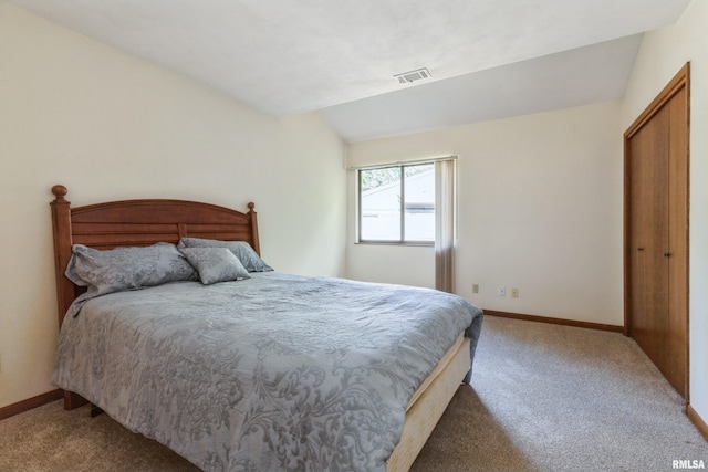 2200 36th Ave Unit 2D, Rock Island, IL 61201 - bedroom featuring carpet floors, a closet, and lofted ceiling