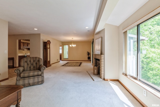 2200 36th Ave Unit 2D, Rock Island, IL 61201 - unfurnished living room with a chandelier, light colored carpet, recessed lighting, and a fireplace