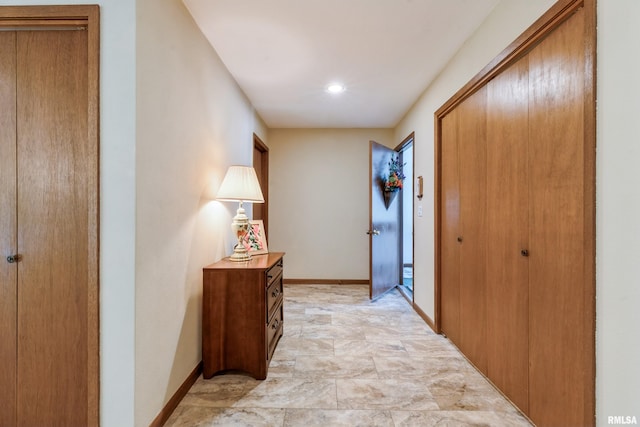 2200 36th Ave Unit 2D, Rock Island, IL 61201 - hallway featuring stone finish flooring and recessed lighting