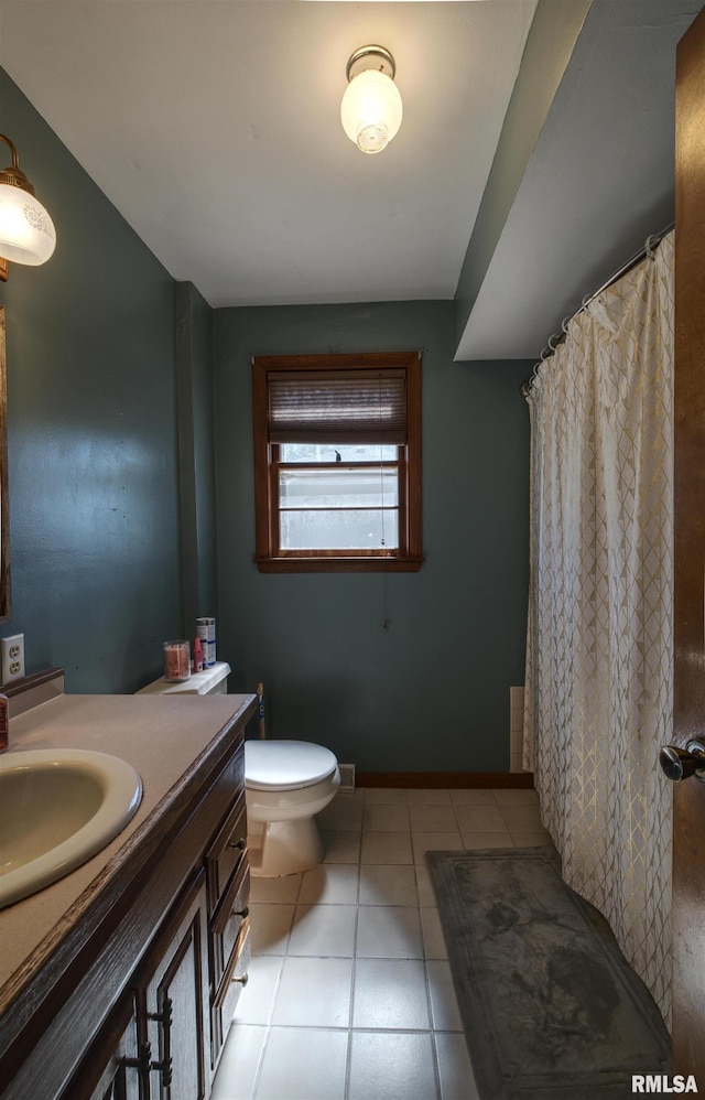 1221 4th St, Camanche, IA 52730 - bathroom featuring vanity, tile patterned flooring, and a shower with shower curtain