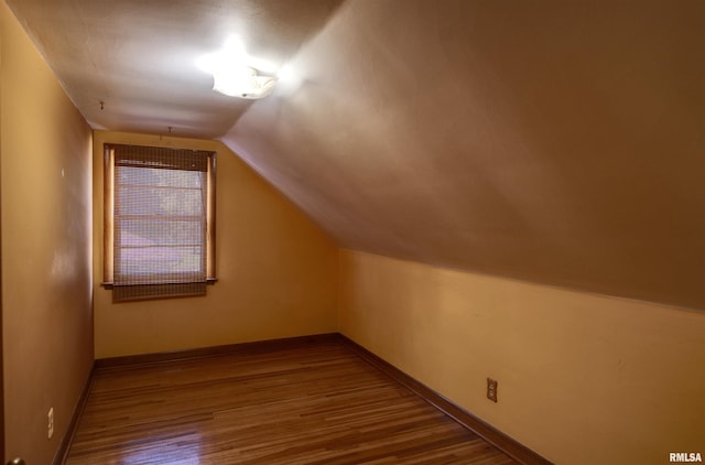 1221 4th St, Camanche, IA 52730 - bonus room with wood finished floors and vaulted ceiling