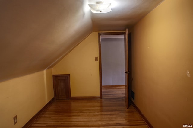 1221 4th St, Camanche, IA 52730 - bonus room with wood finished floors and lofted ceiling