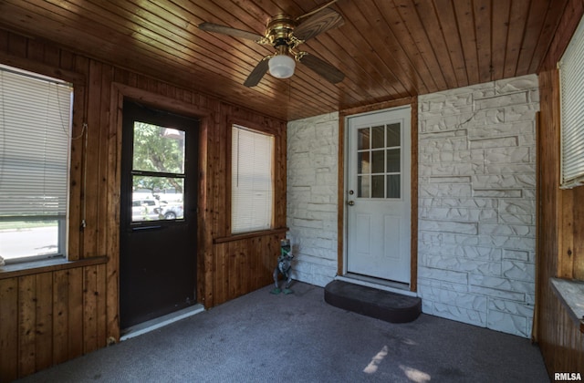 1221 4th St, Camanche, IA 52730 - view of exterior entry featuring a ceiling fan
