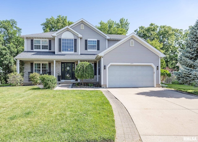 624 Mineral Creek Dr, Colona, IL 61241 - view of front of property featuring driveway, an attached garage, a front lawn, a porch, and a shingled roof