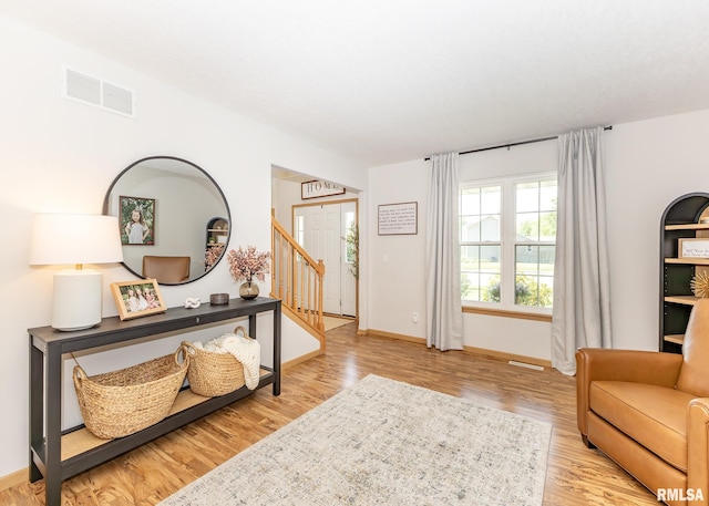 624 Mineral Creek Dr, Colona, IL 61241 - entryway with wood finished floors and stairway