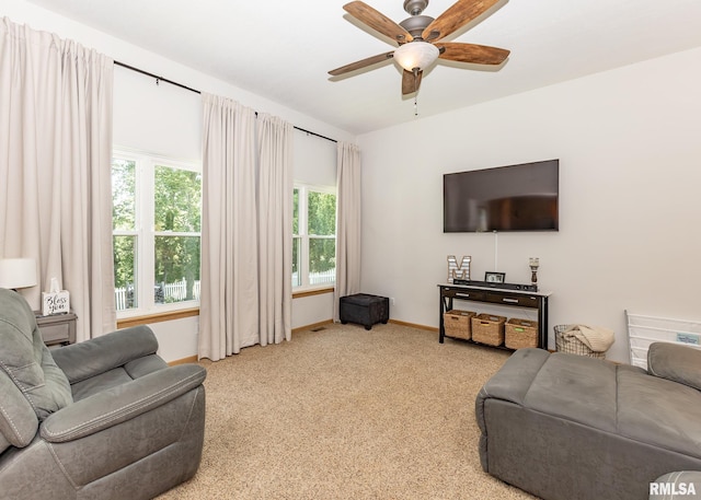 624 Mineral Creek Dr, Colona, IL 61241 - living room with ceiling fan and light carpet