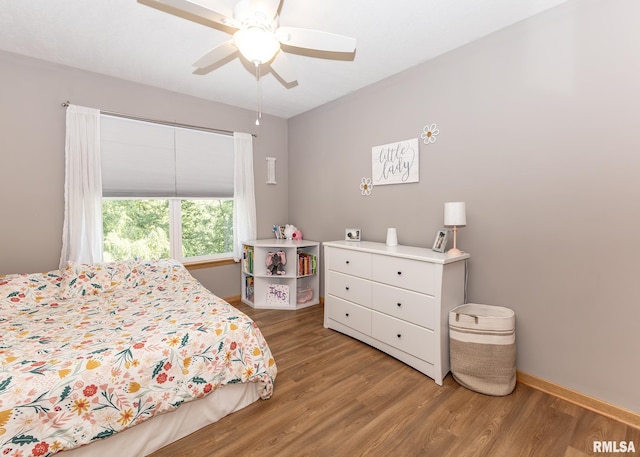624 Mineral Creek Dr, Colona, IL 61241 - bedroom featuring light wood-type flooring and a ceiling fan