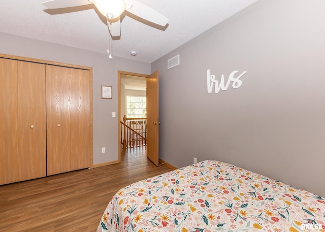 624 Mineral Creek Dr, Colona, IL 61241 - bedroom featuring wood finished floors, a closet, and a ceiling fan