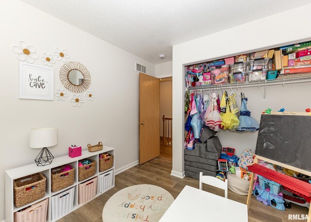 624 Mineral Creek Dr, Colona, IL 61241 - recreation room featuring wood finished floors