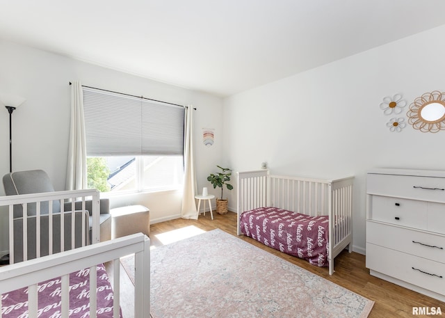 624 Mineral Creek Dr, Colona, IL 61241 - bedroom featuring wood finished floors and baseboards