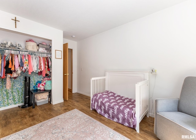 624 Mineral Creek Dr, Colona, IL 61241 - bedroom with wood finished floors and a closet
