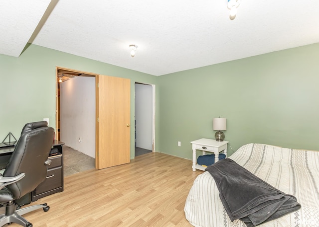 624 Mineral Creek Dr, Colona, IL 61241 - bedroom featuring light wood-style flooring and a desk