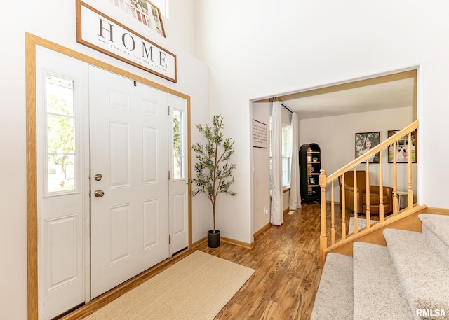 624 Mineral Creek Dr, Colona, IL 61241 - foyer with light wood-style floors and stairway