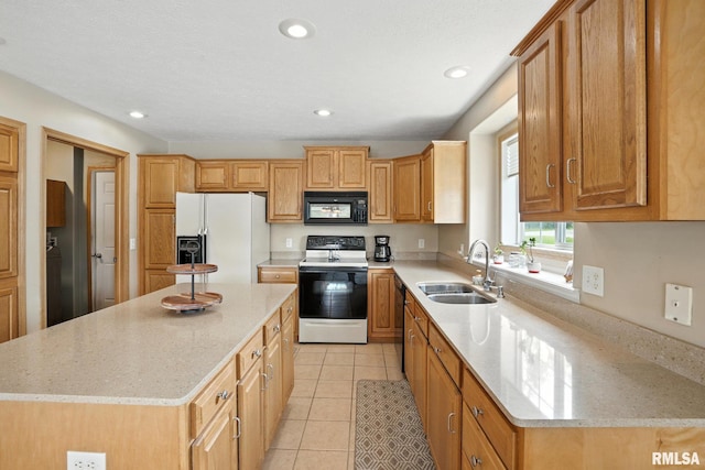 106 Valley View Dr, Sherrard, IL 61281 - kitchen featuring black appliances, a kitchen island, light stone counters, recessed lighting, and light tile patterned floors