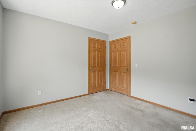 106 Valley View Dr, Sherrard, IL 61281 - empty room featuring light colored carpet and baseboards