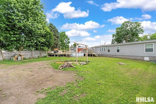 524 6th St, Andover, IL 61233 - view of yard with a deck and stairs