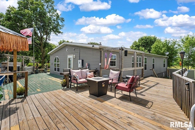 524 6th St, Andover, IL 61233 - deck featuring an outdoor living space with a fire pit