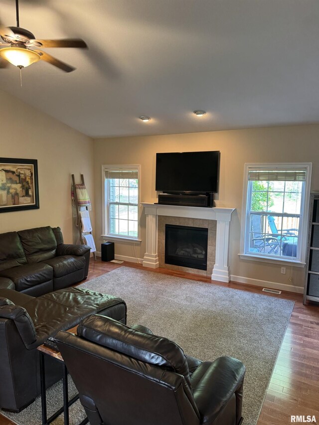 310 Westminster Rd, Germantown Hills, IL 61548 - living area featuring wood finished floors, a tile fireplace, and ceiling fan