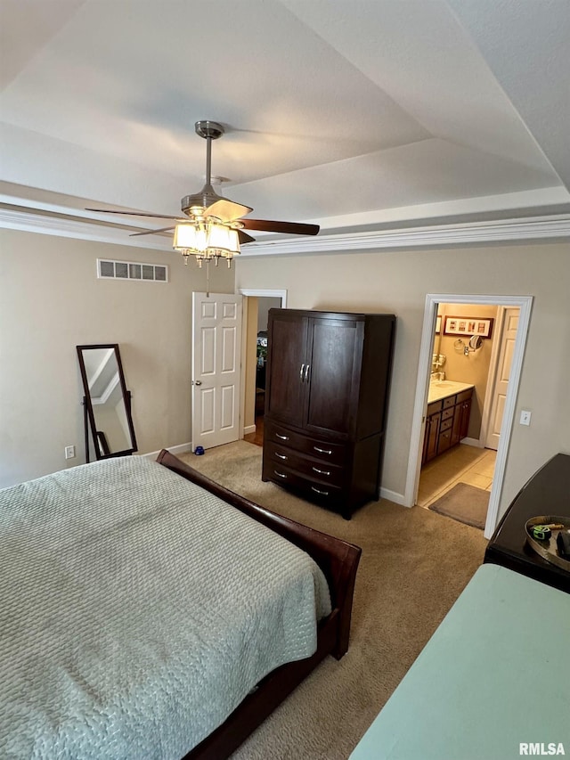310 Westminster Rd, Germantown Hills, IL 61548 - bedroom with a raised ceiling, light carpet, a ceiling fan, connected bathroom, and ornamental molding