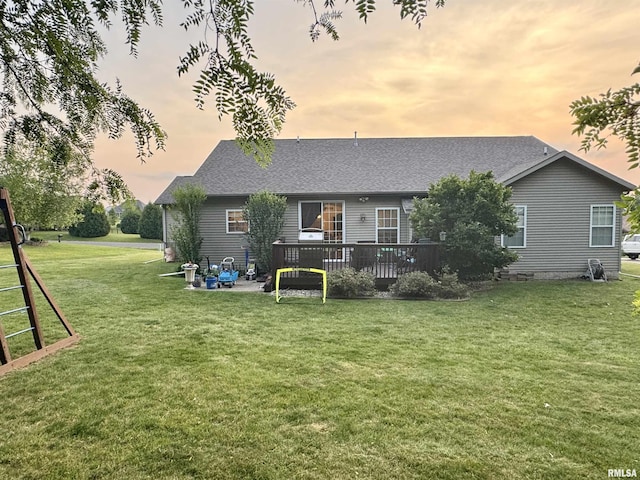310 Westminster Rd, Germantown Hills, IL 61548 - rear view of house featuring a lawn, a deck, and roof with shingles