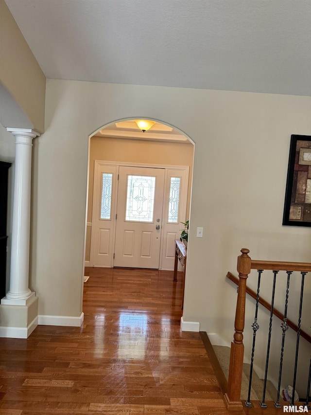 310 Westminster Rd, Germantown Hills, IL 61548 - entryway featuring wood finished floors, arched walkways, and decorative columns