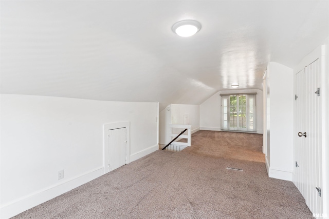 107 S High St, Port Byron, IL 61275 - additional living space featuring lofted ceiling and carpet flooring