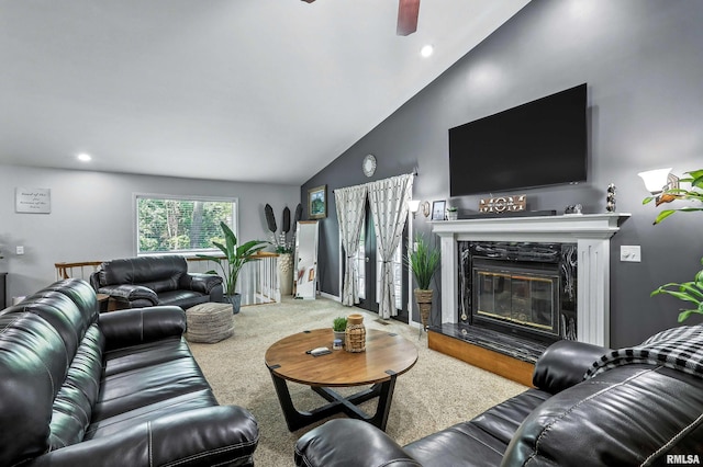 885 47th Ave, East Moline, IL 61244 - carpeted living area featuring lofted ceiling, a ceiling fan, a premium fireplace, and recessed lighting
