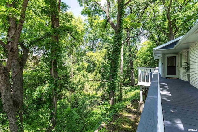 885 47th Ave, East Moline, IL 61244 - wooden deck with a forest view