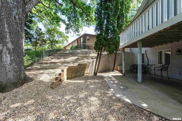 885 47th Ave, East Moline, IL 61244 - fenced backyard featuring a patio