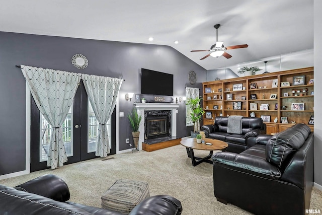 885 47th Ave, East Moline, IL 61244 - carpeted living room featuring lofted ceiling, ceiling fan, and a fireplace
