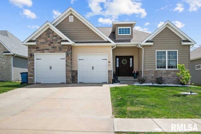 67 Cobblestone Ln, Le Claire, IA 52753 - craftsman house with stone siding, driveway, a front yard, an attached garage, and roof with shingles