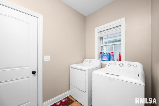 67 Cobblestone Ln, Le Claire, IA 52753 - laundry room featuring separate washer and dryer and baseboards