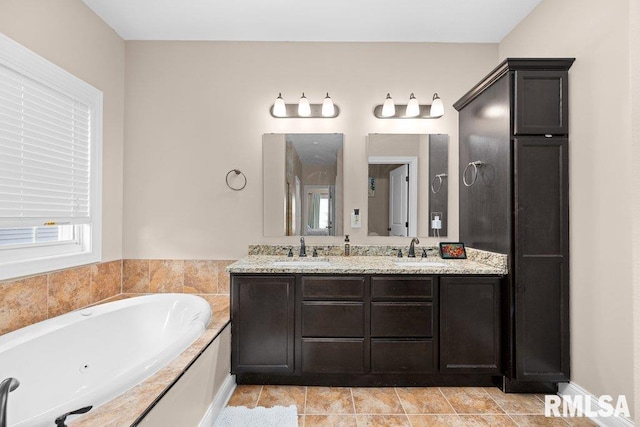 67 Cobblestone Ln, Le Claire, IA 52753 - full bath featuring double vanity and a jetted tub