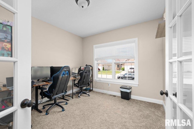 67 Cobblestone Ln, Le Claire, IA 52753 - office with carpet floors and french doors
