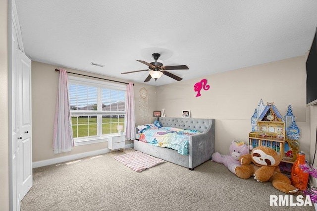 67 Cobblestone Ln, Le Claire, IA 52753 - carpeted bedroom featuring baseboards and ceiling fan