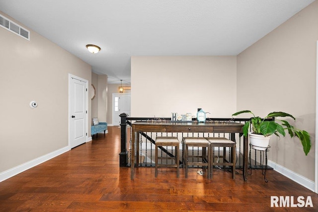 67 Cobblestone Ln, Le Claire, IA 52753 - dining space with baseboards and wood finished floors