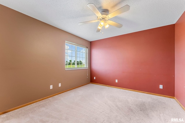 3215 S 16th Ave Unit 201, Eldridge, IA 52748 - carpeted empty room featuring ceiling fan and a textured ceiling