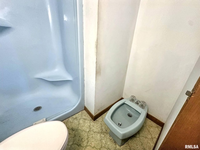 900 E 4th St, West Frankfort, IL 62896 - full bathroom featuring a bidet and a shower stall