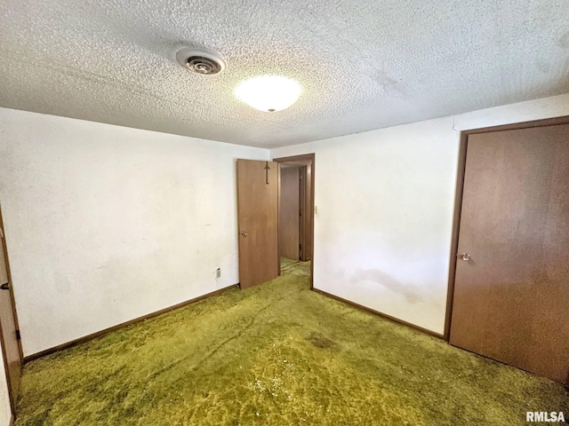 900 E 4th St, West Frankfort, IL 62896 - unfurnished bedroom featuring carpet floors and baseboards