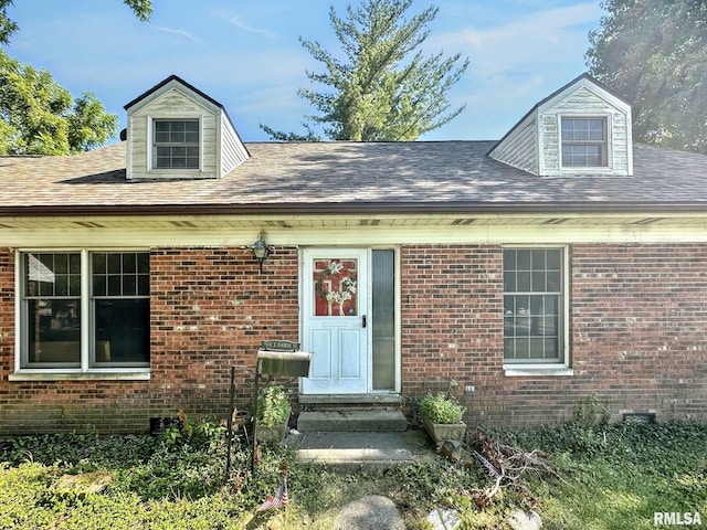 900 E 4th St, West Frankfort, IL 62896 - entrance to property with brick siding and a shingled roof