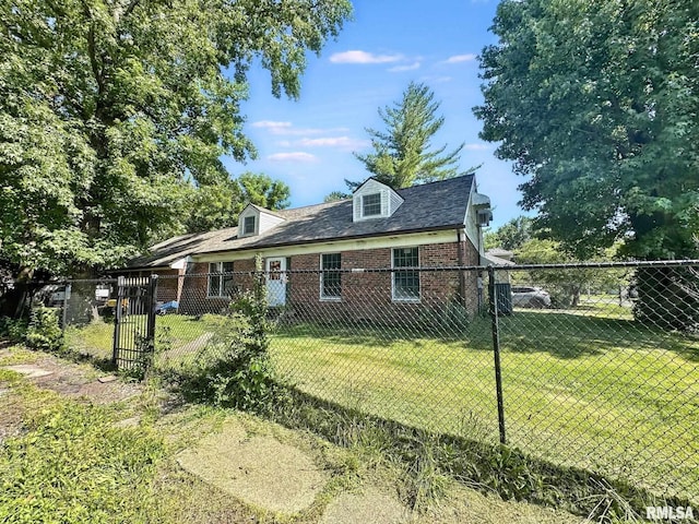 900 E 4th St, West Frankfort, IL 62896 - view of side of home featuring brick siding and a gate