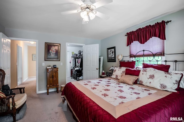 805 New Day Way, Marion, IL 62959 - bedroom with carpet, a walk in closet, a ceiling fan, and a closet