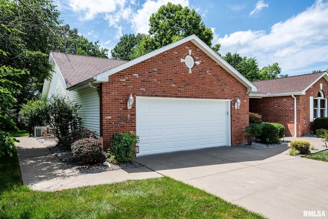 805 New Day Way, Marion, IL 62959 - view of front of home with concrete driveway, a garage, brick siding, and a shingled roof