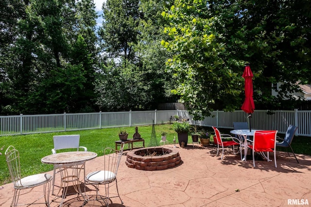 805 New Day Way, Marion, IL 62959 - fenced backyard featuring a patio, outdoor dining area, and an outdoor fire pit