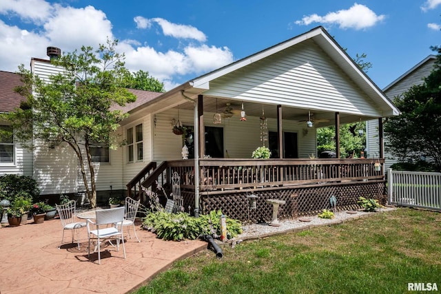 805 New Day Way, Marion, IL 62959 - back of property featuring ceiling fan, a patio area, a chimney, and a wooden deck