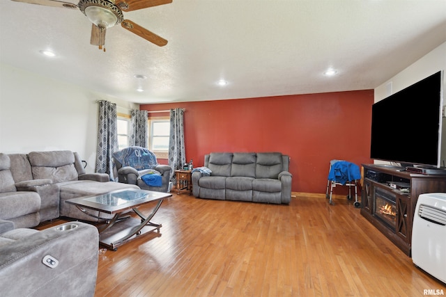829 Union Ave, Lowden, IA 52255 - living area with light wood-style floors, ceiling fan, and recessed lighting